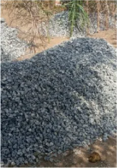 A pile of crushed stone delivered to the New Cess school construction site